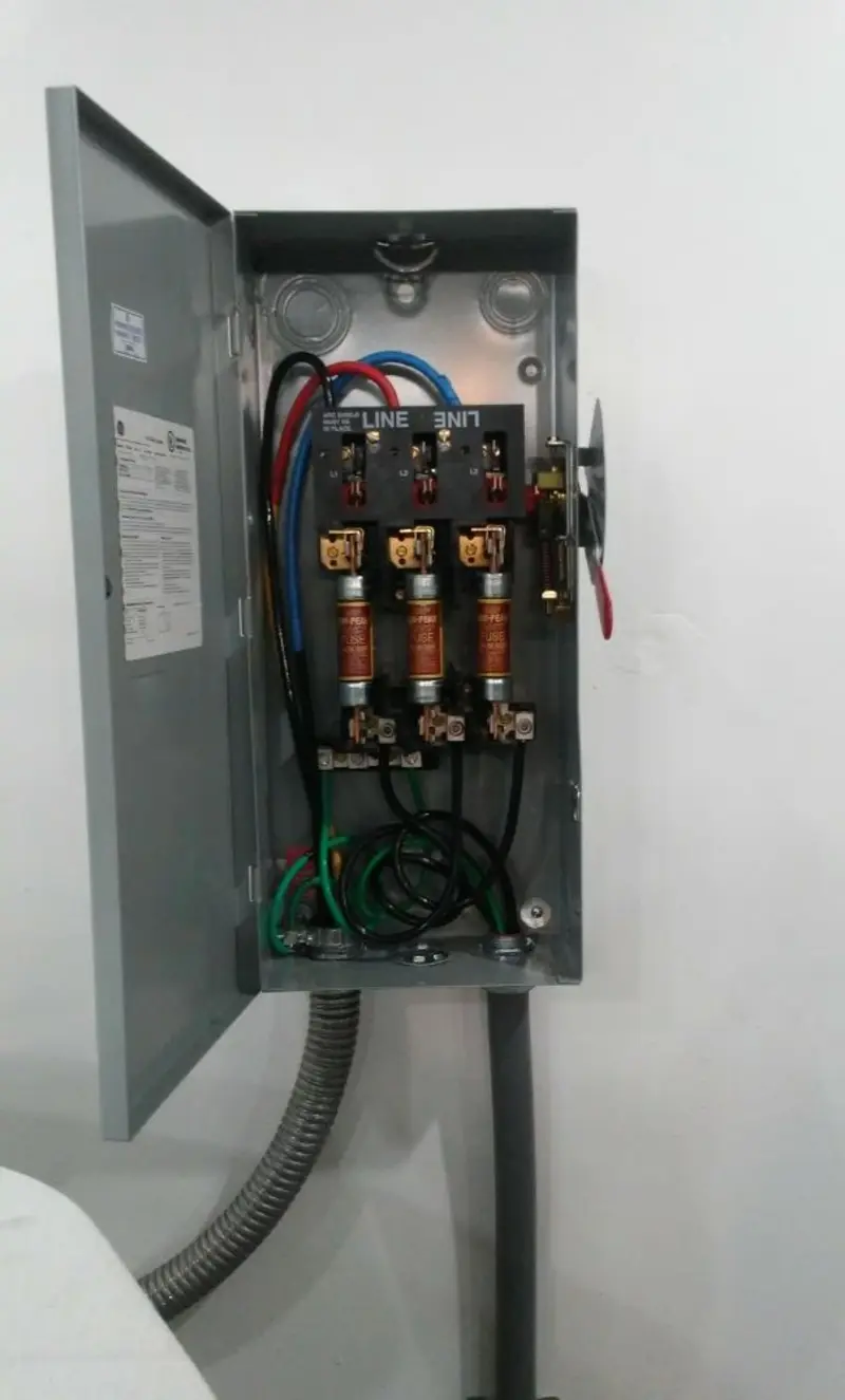 Three-phase disconnect switch installed for Smoke Detector Installation in Key Biscayne